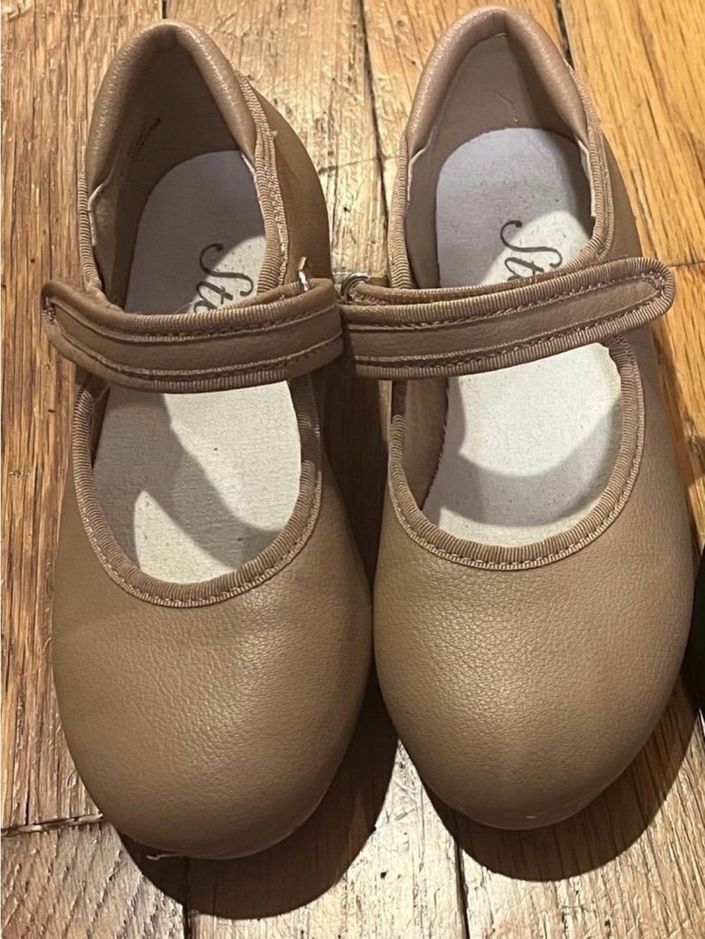 Beige tap shoes